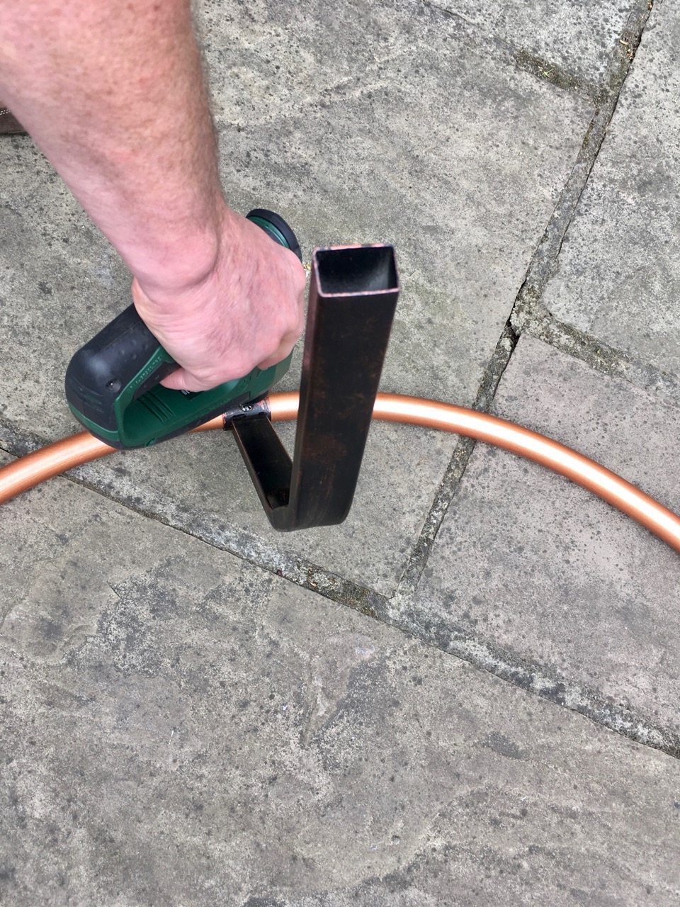 assembling the outer copper ring and attaching the legs
