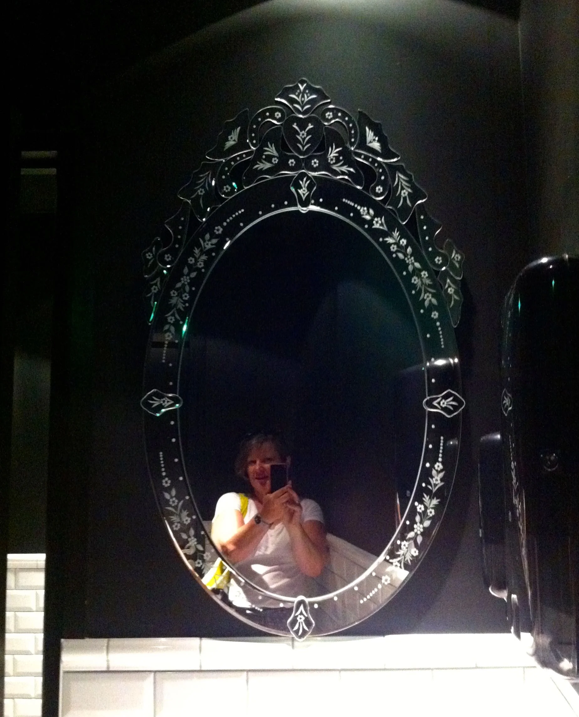 A fancy mirror totally in keeping with the theme