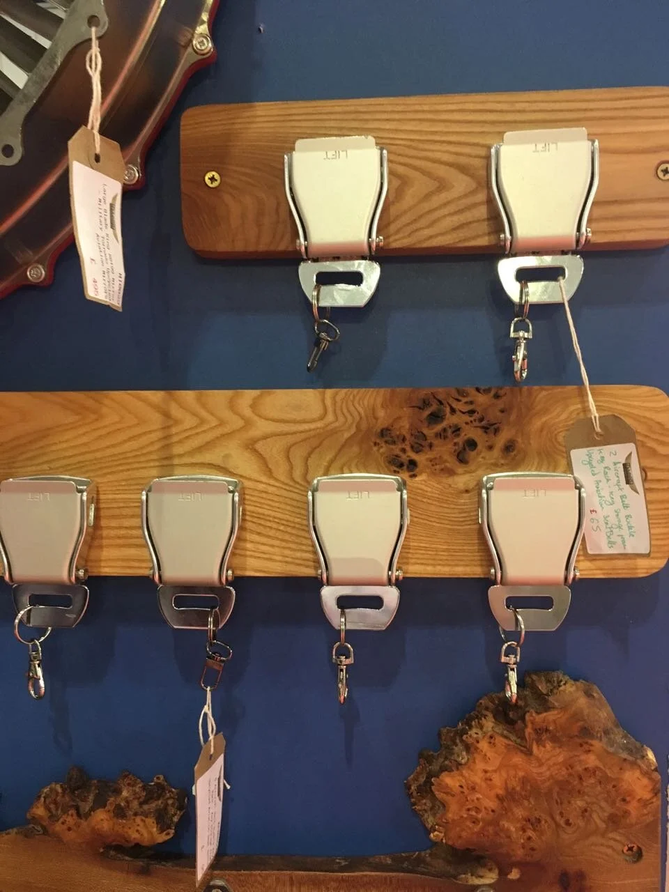 airplane seat belts repurposed as key racks