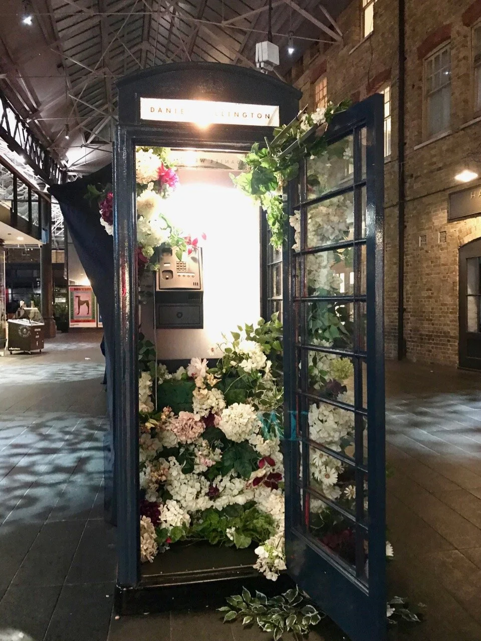 flowers in a phone box, what else