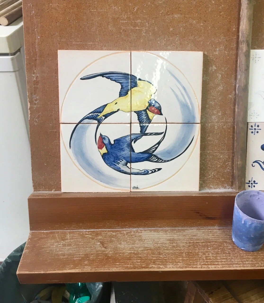 swallows on a portuguese tile