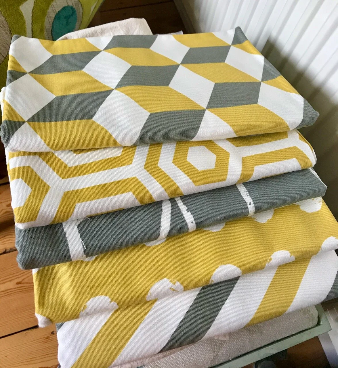 yellow white and grey geometric material