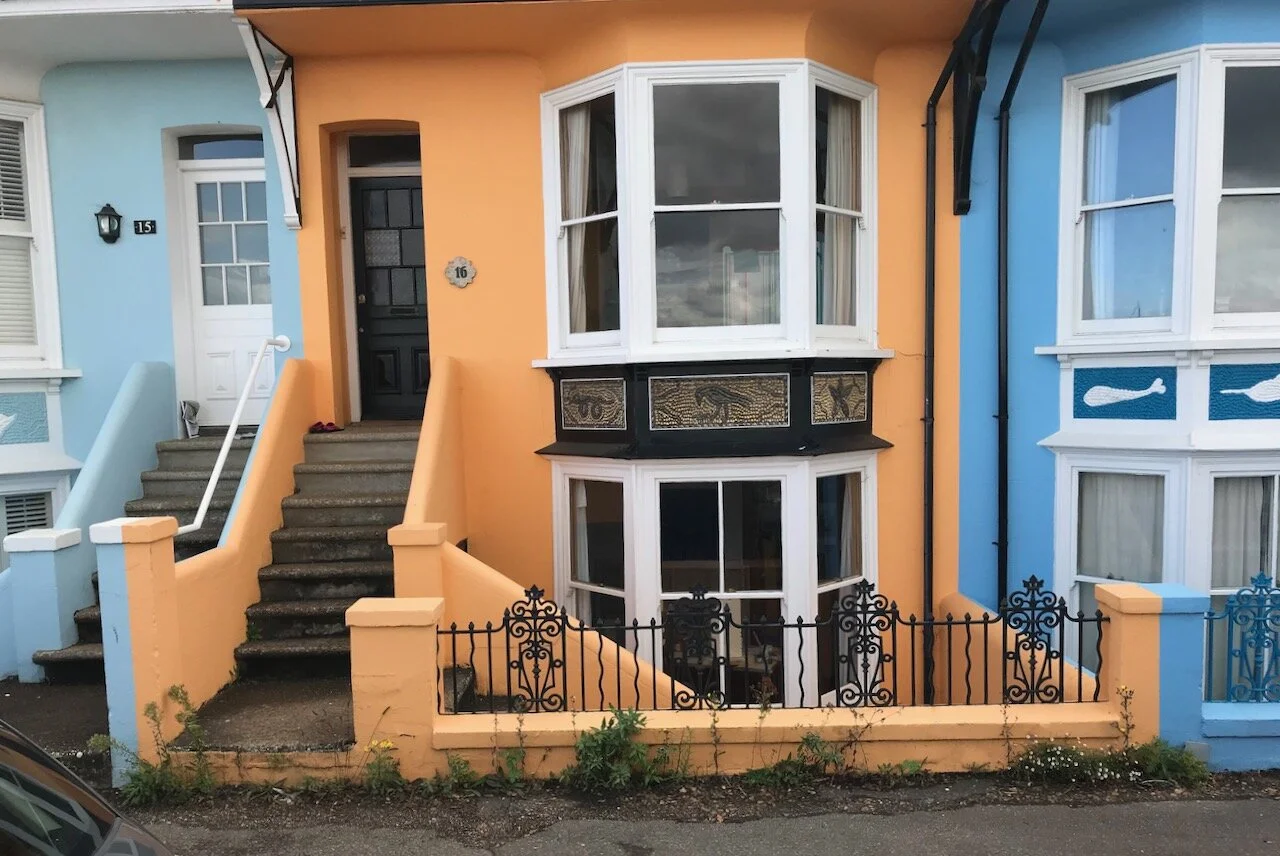 orange and blue houses together