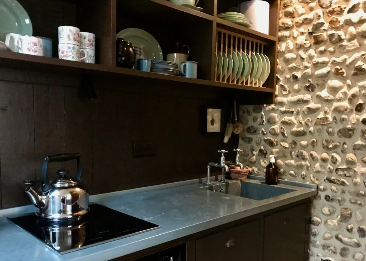 a sink in a zinc worktop