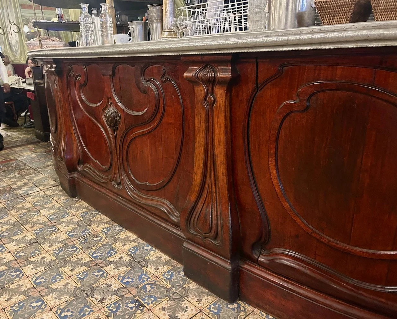 More highly decorative carved wood for this bar/serving area