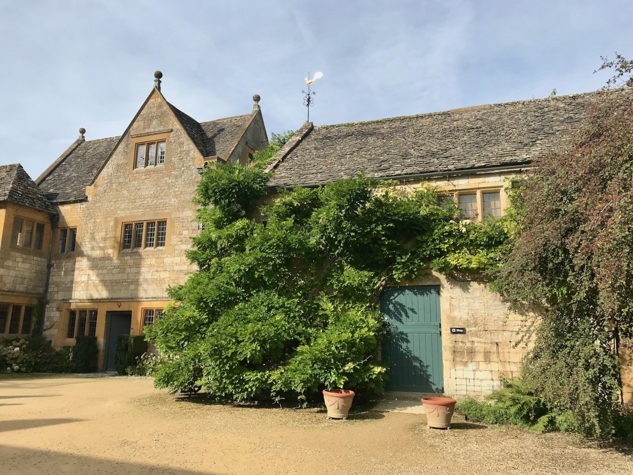 In the main courtyard looking towards the house as you'd expect full of the yellow cotswold stone