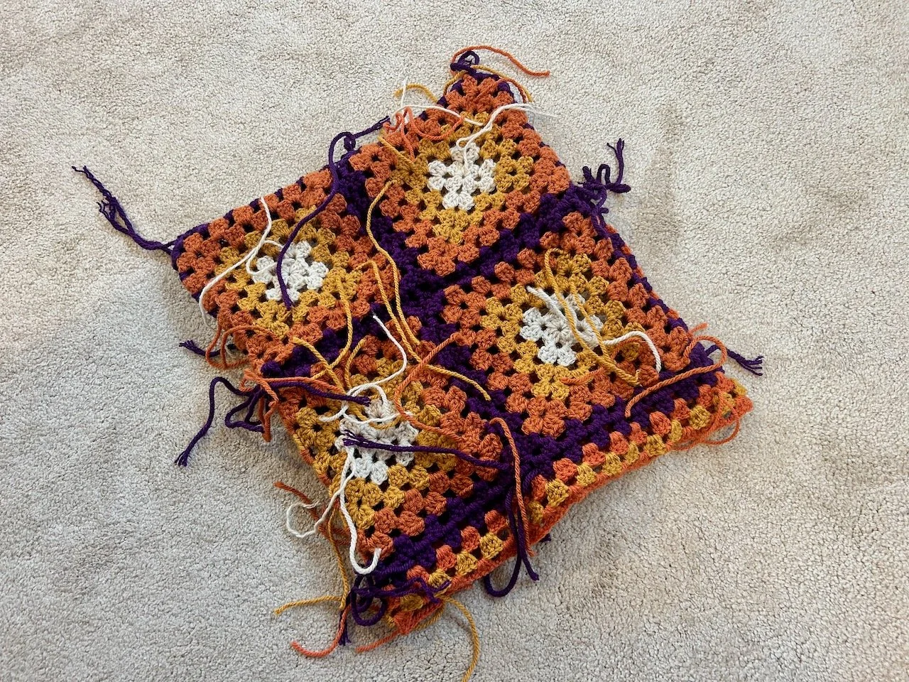 the eight squares assembled - and inside out - showing the ends to be sewn in