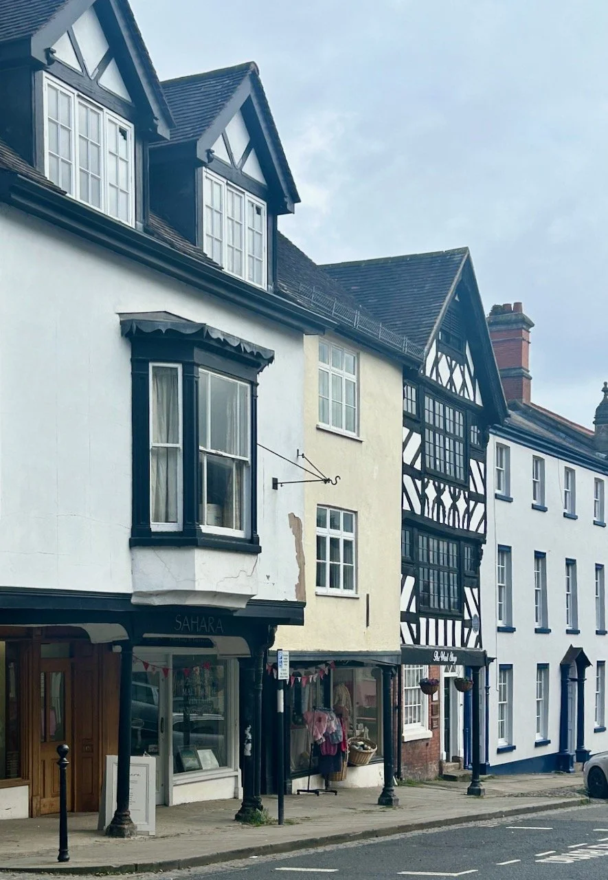 That cream building is the wool shop, which seemed to call me and my SIL