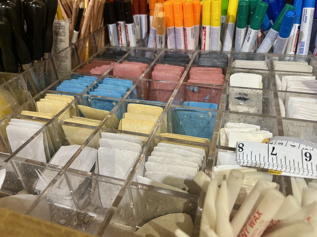 Tailor's chalk in charcoal, pink, blue, yellow and white
