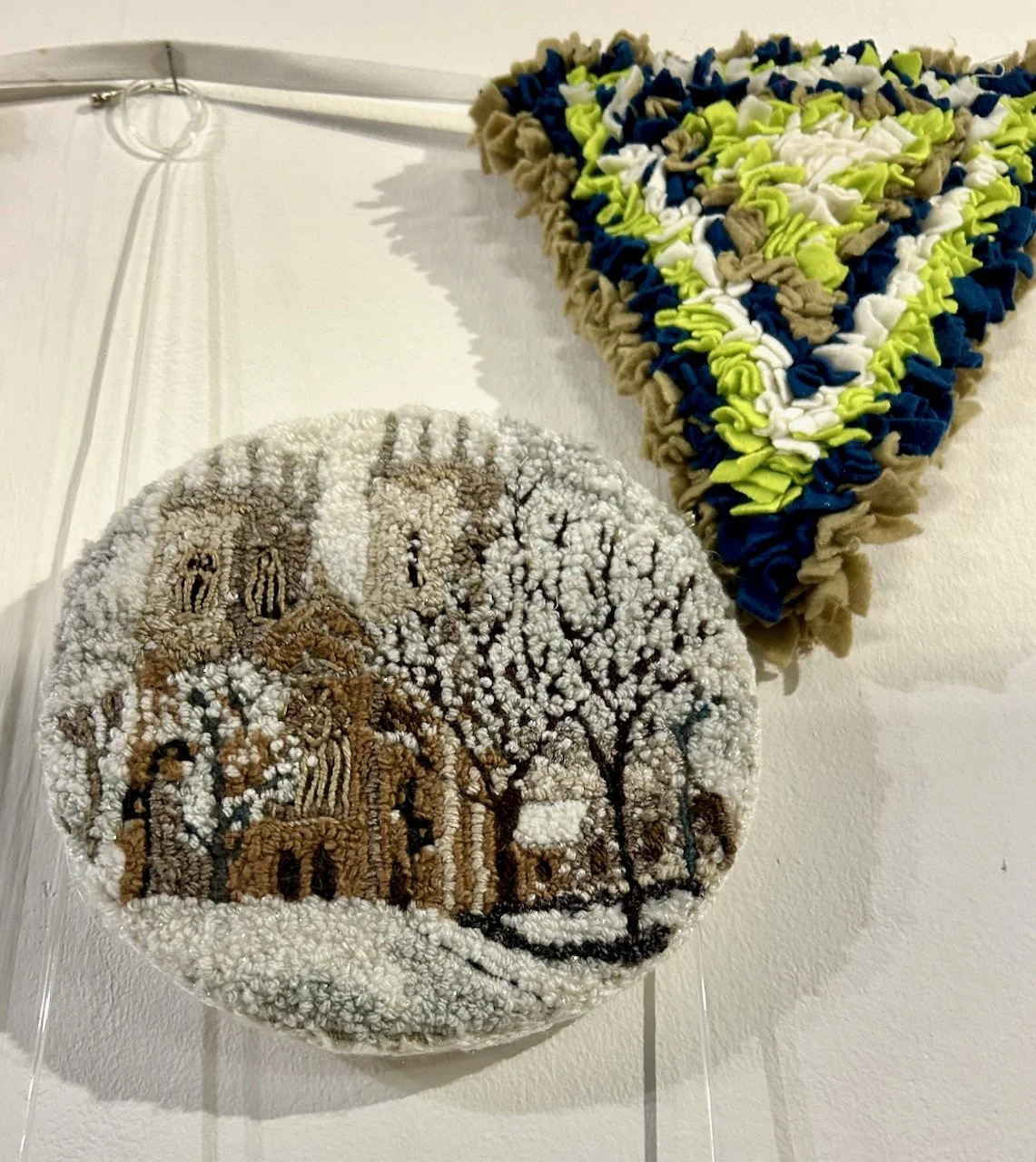 A Church in the snow and rag rugged bunting, Ebor ruggers, Harrogate Knit & Stitch show 2025