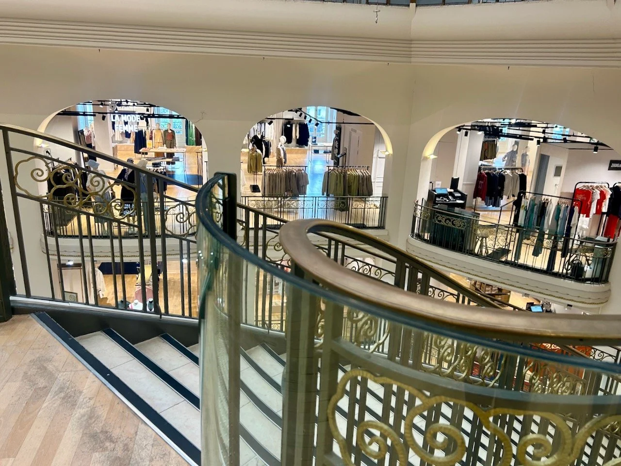 Looking down the stairs and the superb curved handrails on the stair case