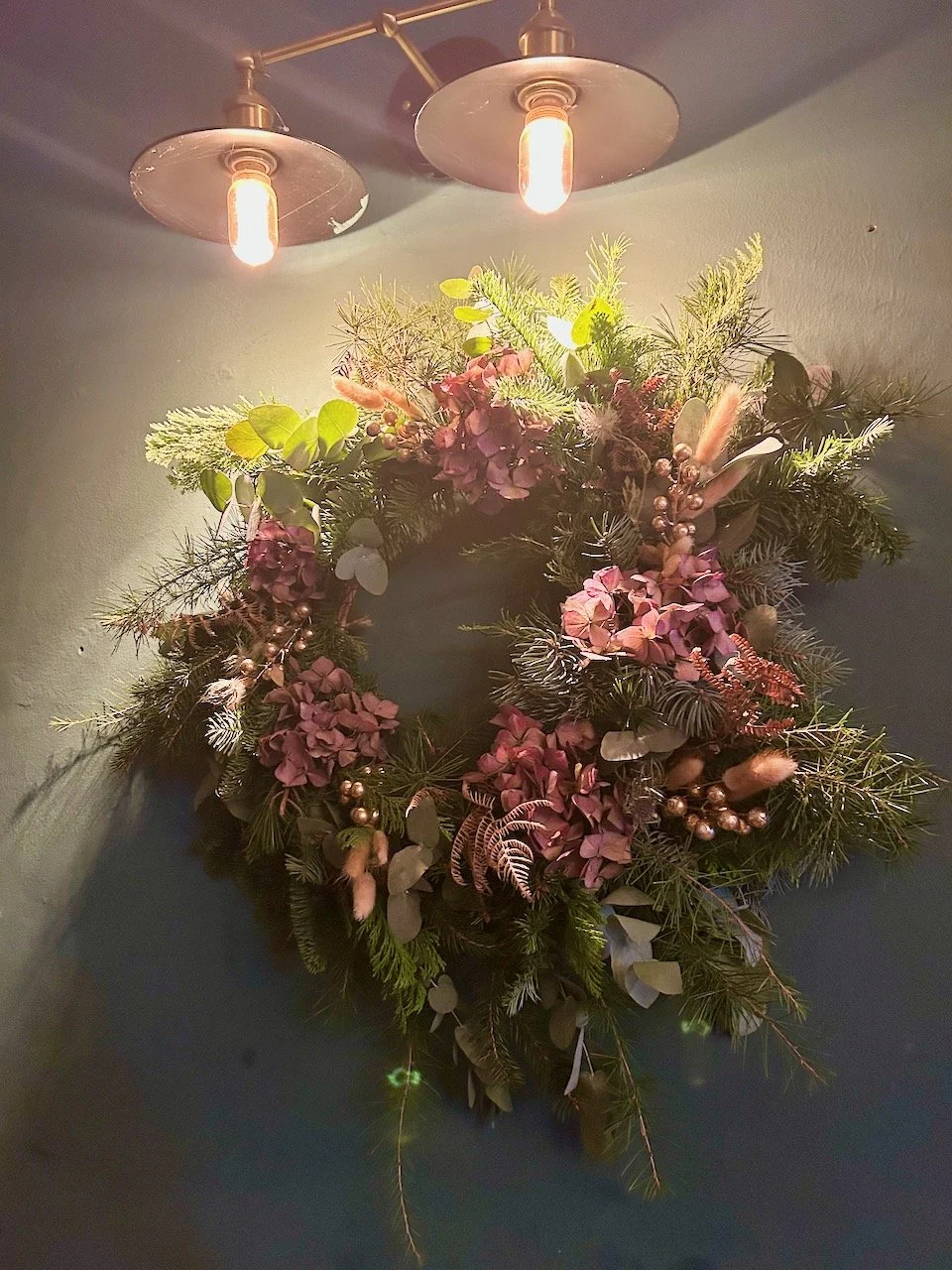 Finished and hanging on the pub's wall underneath two brass lights - so the colours and light distribution are distorted