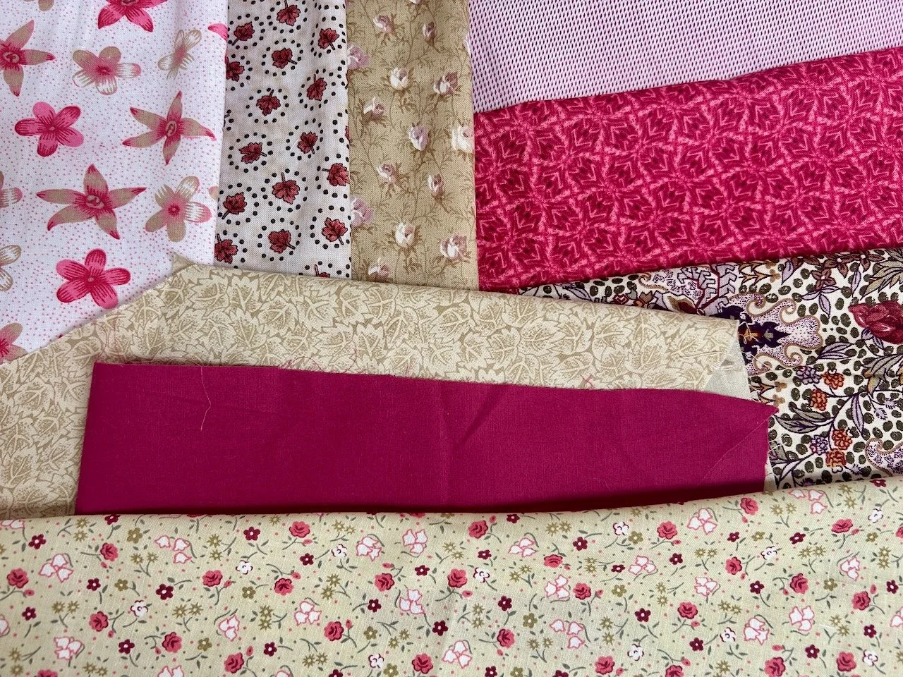 Pulling caramel and raspberry toned fabrics from my stash