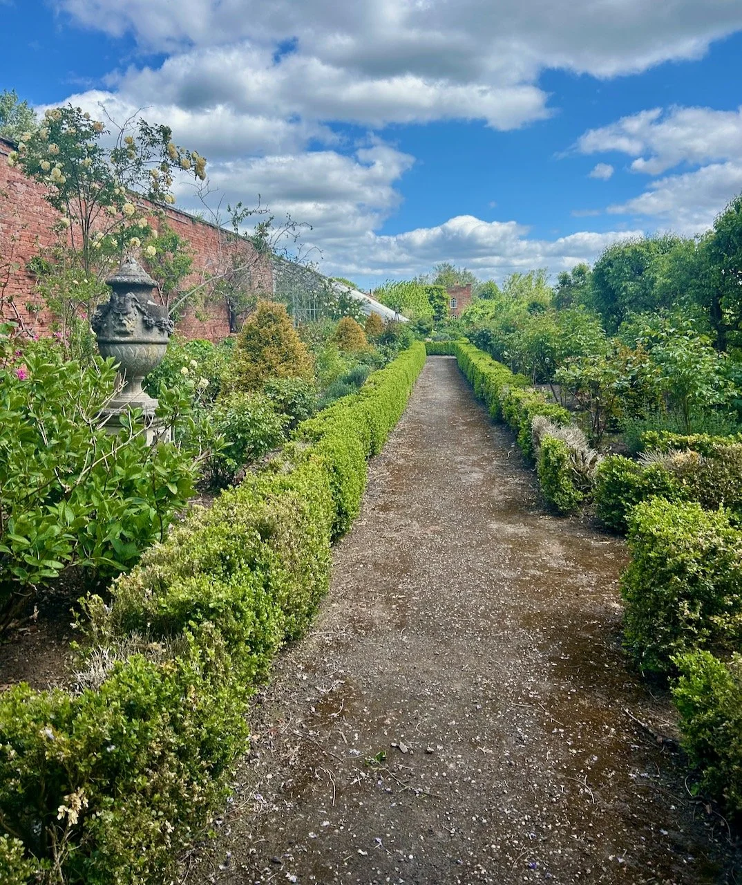 The first look inside the walled garden looking along the long border