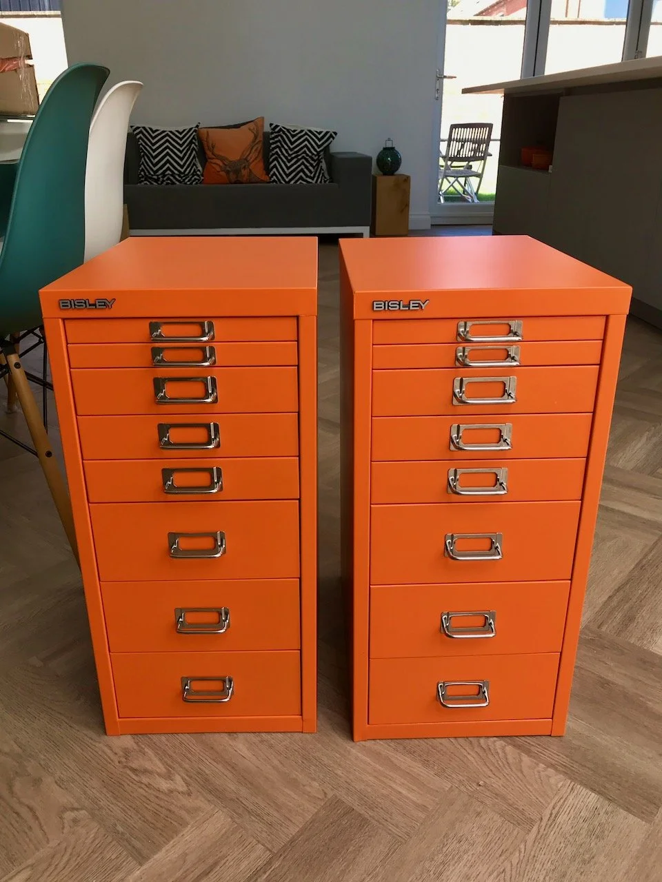 Two eight drawer Bisley drawer units in orange