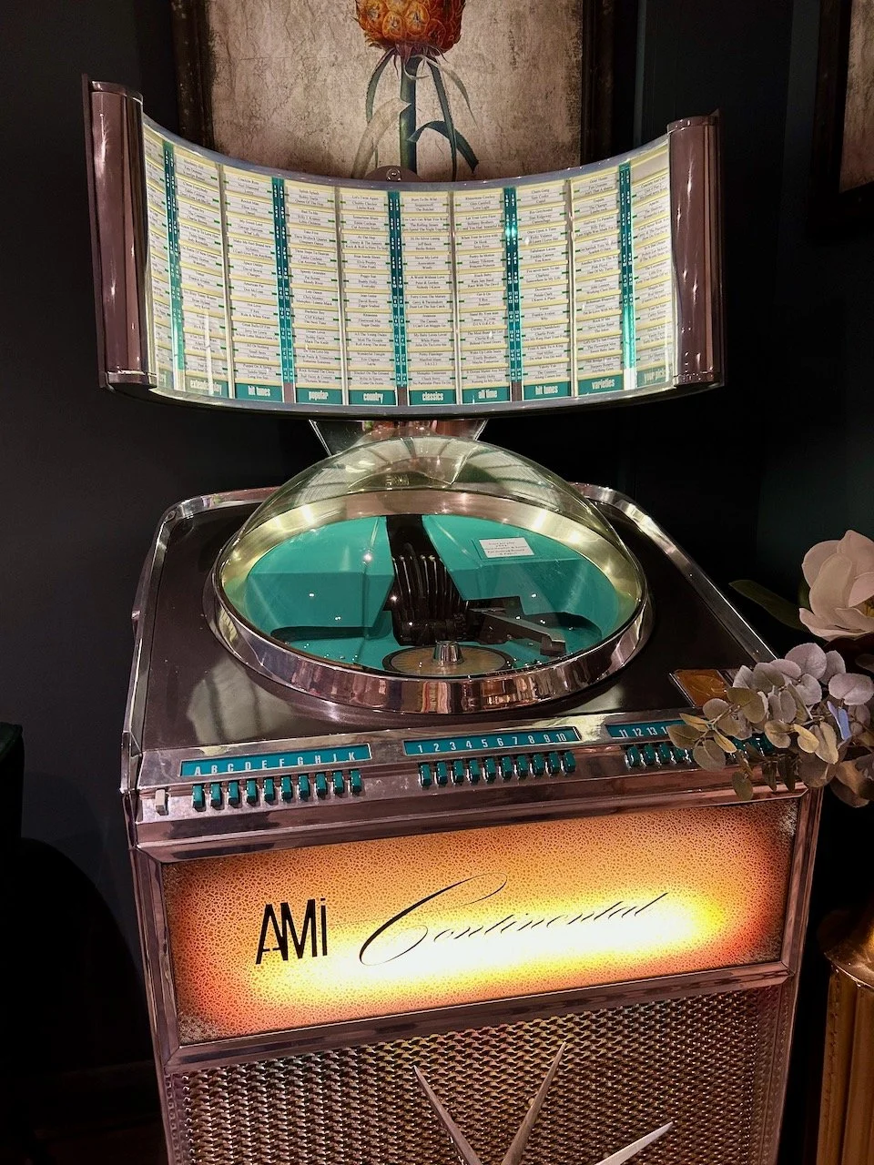 The fabulous teal and gold coloured AMi Continental juke box