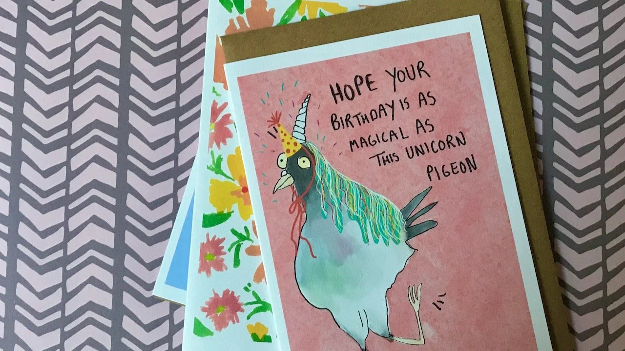 On top of the previous cards, a picture of a unicorn pigeon on a pink background with text "hope your birthday is as magical as this unicorn pigeon"