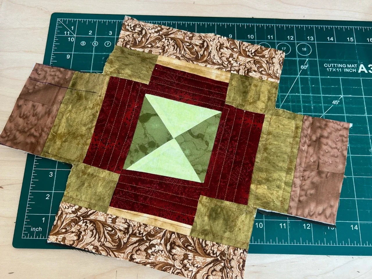 The fabric storage box before assembly - the squares are cut out to form the uprights