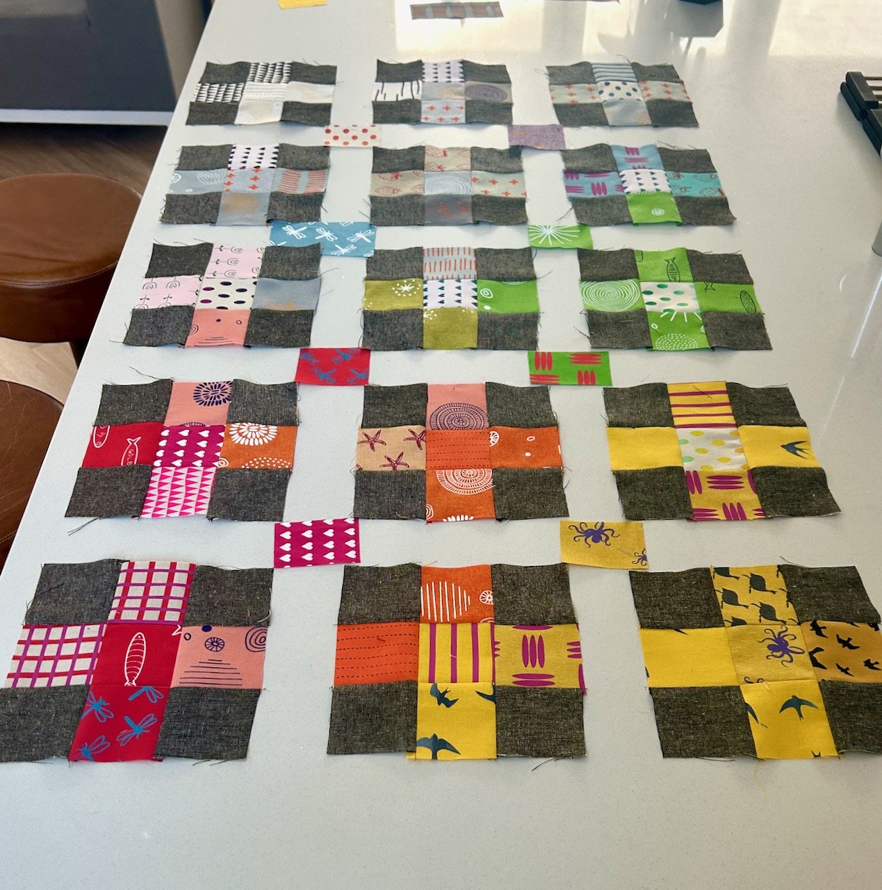 Testing pops of colour in the corners of each block