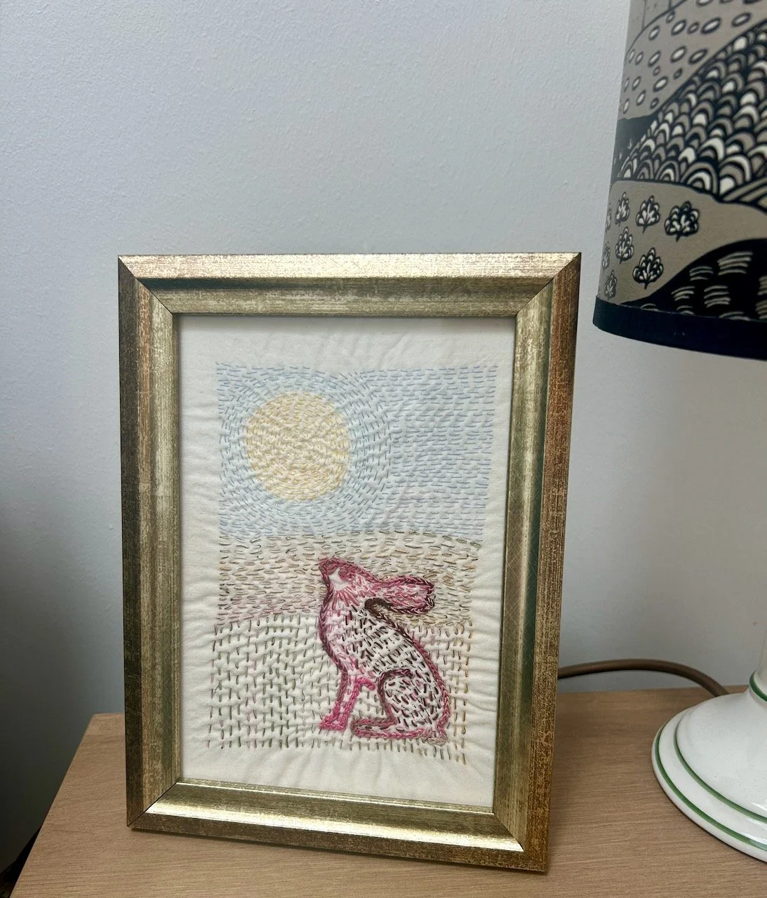 A kantha stitched landscape, and a hare too