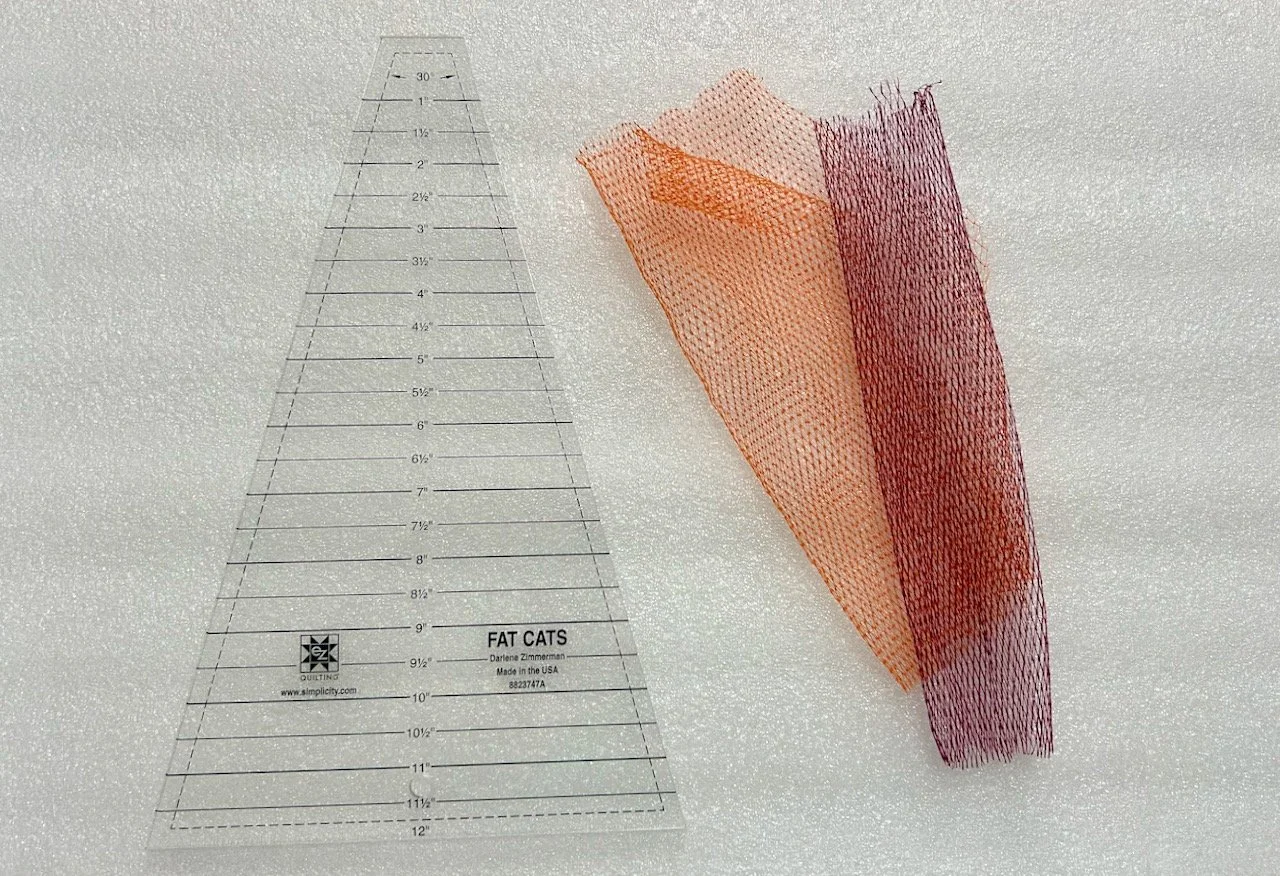 A triangular ruler, and two onion nets