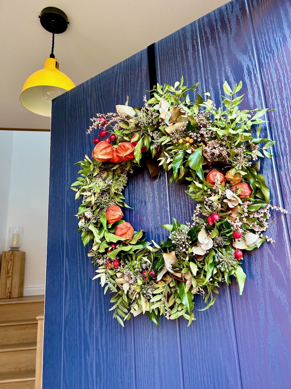 My autumn wreath fading a little on our open door