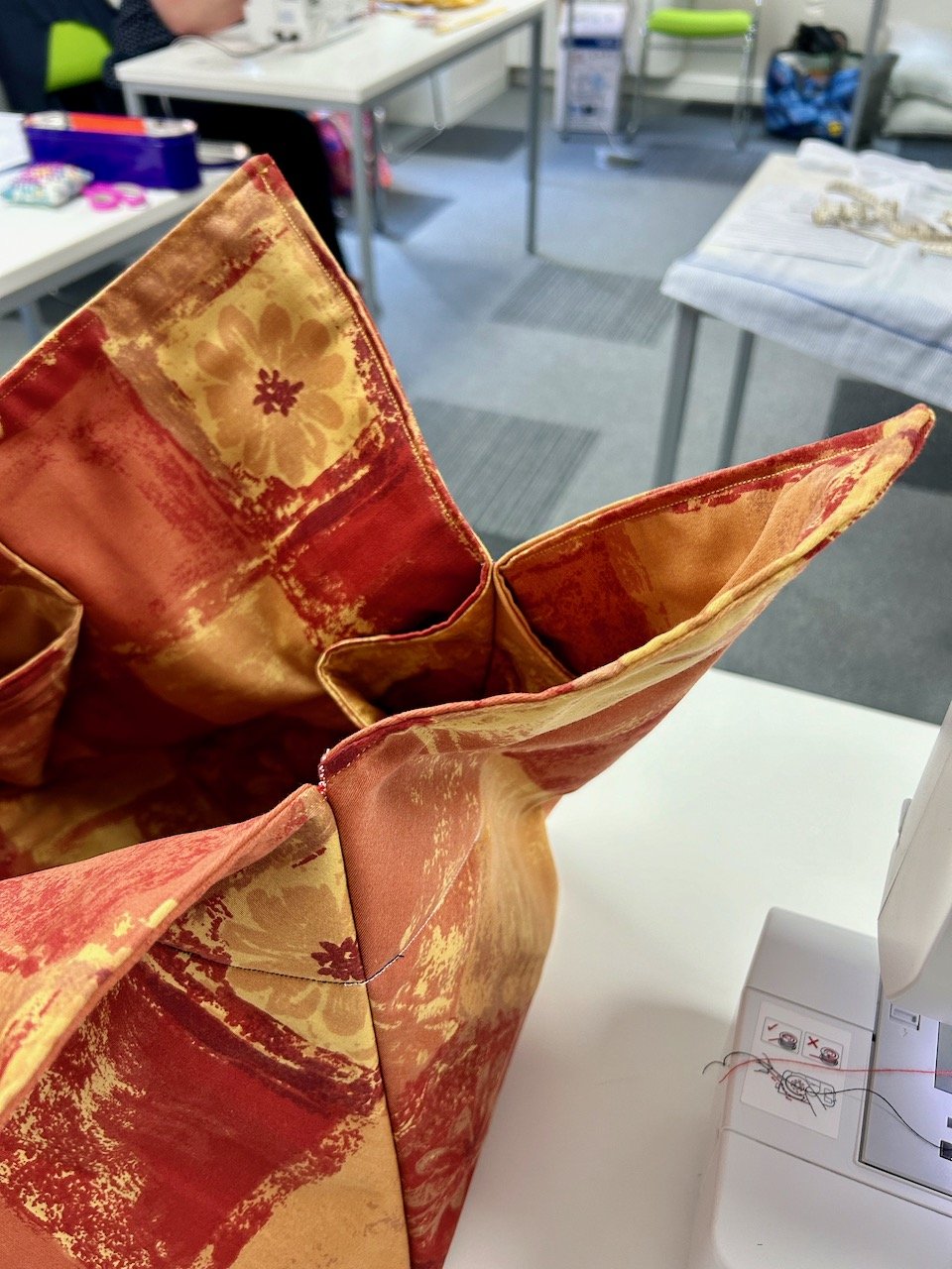 mid-way through bag making with my old curtains in the 'classroom'