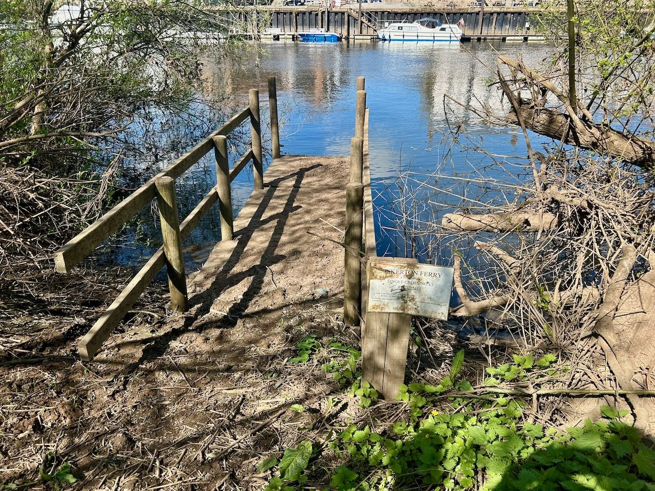 A much closer look at the wooden jetty, but still from the river bank