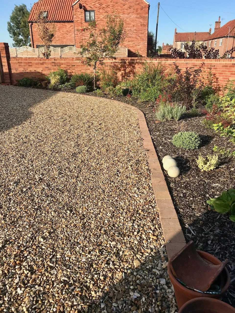 The planted border now clear of the 'border' of pots