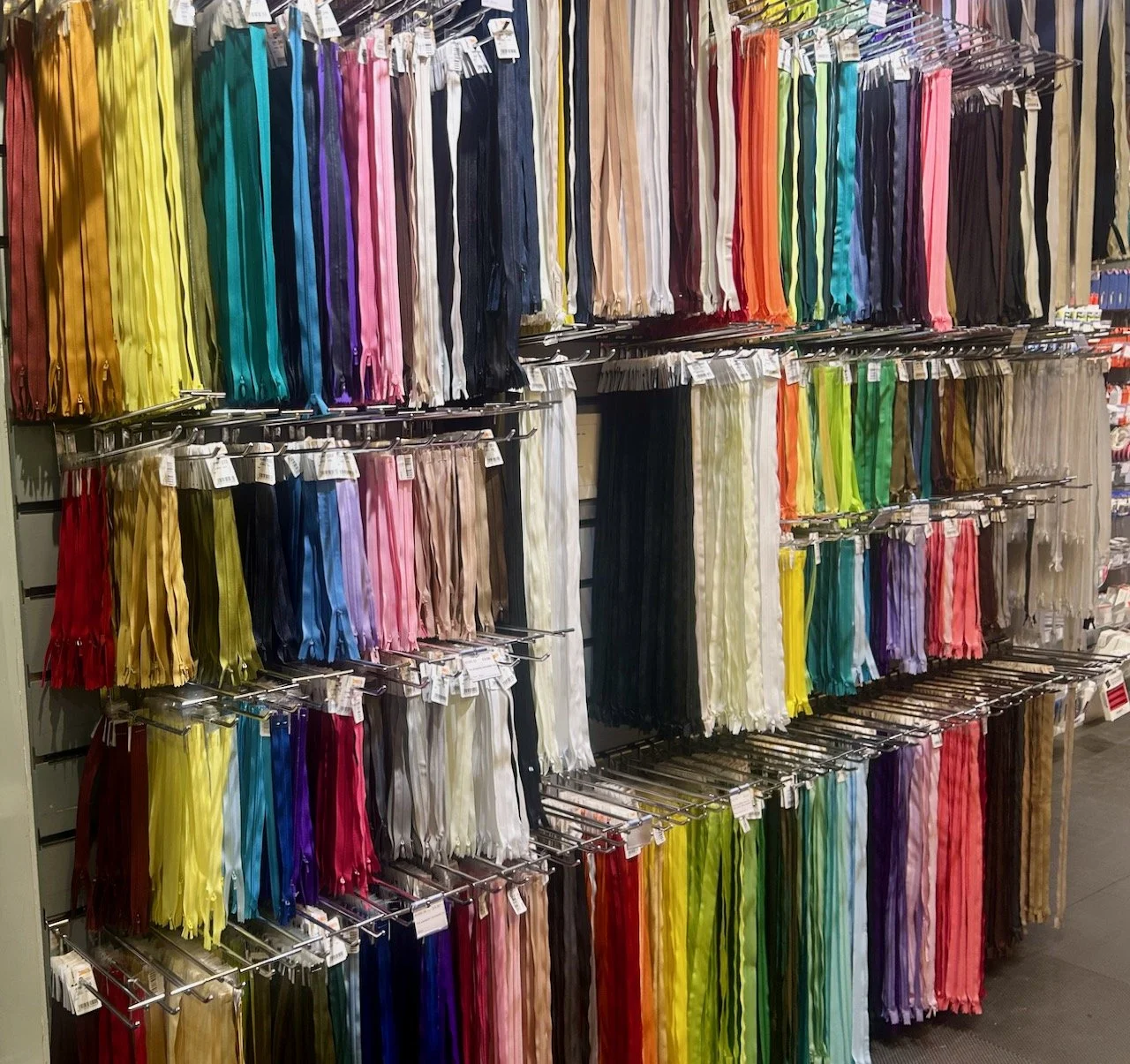 A wall of zips - choose your colour and length - it's not as easy as you think!