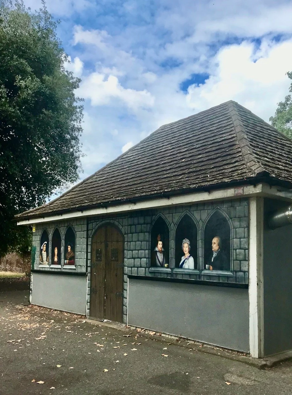 The cafe in Charlton Park complete with painted Kings and Queens in the windows