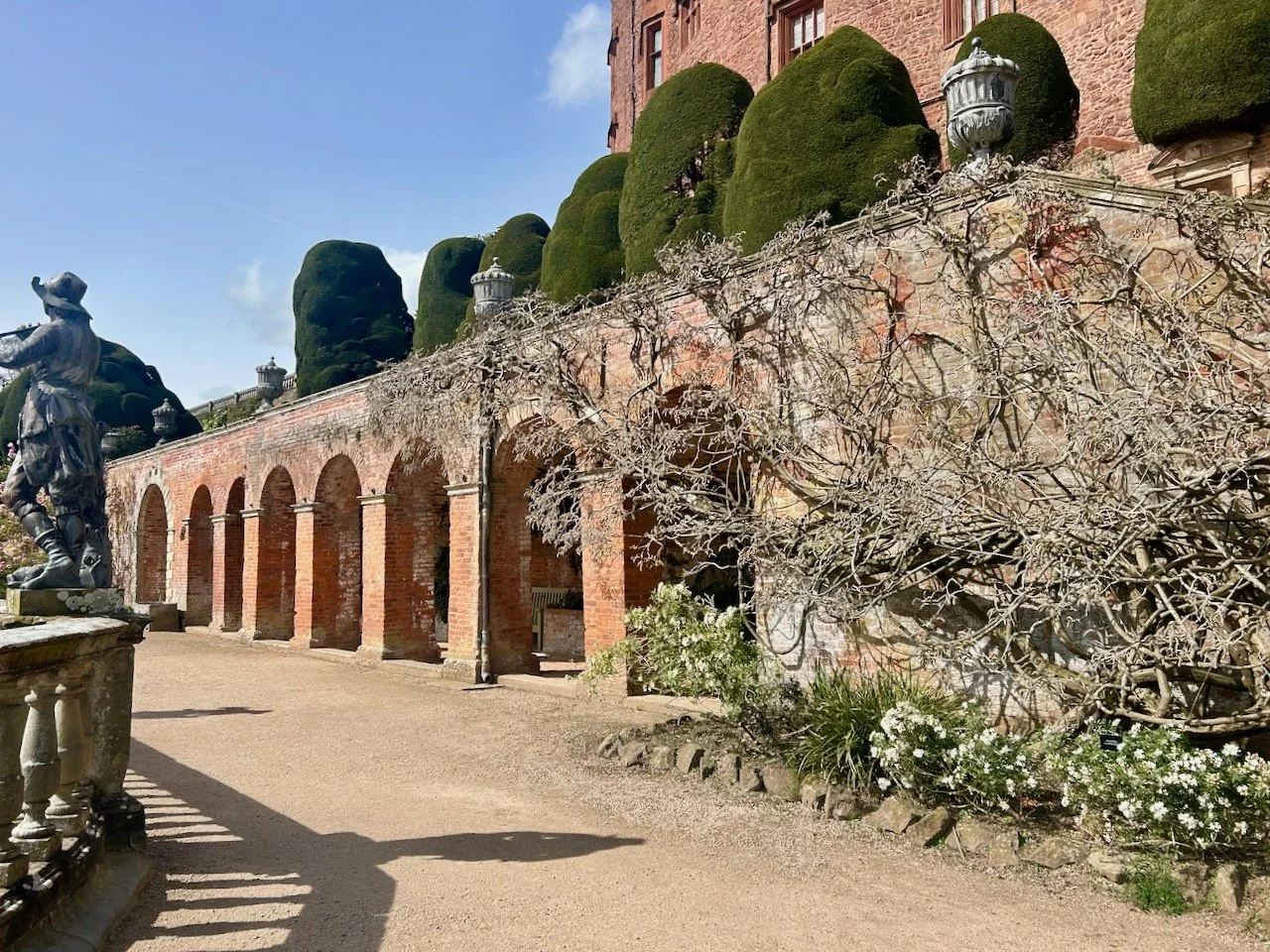 A series of brick arches built into the terrace above