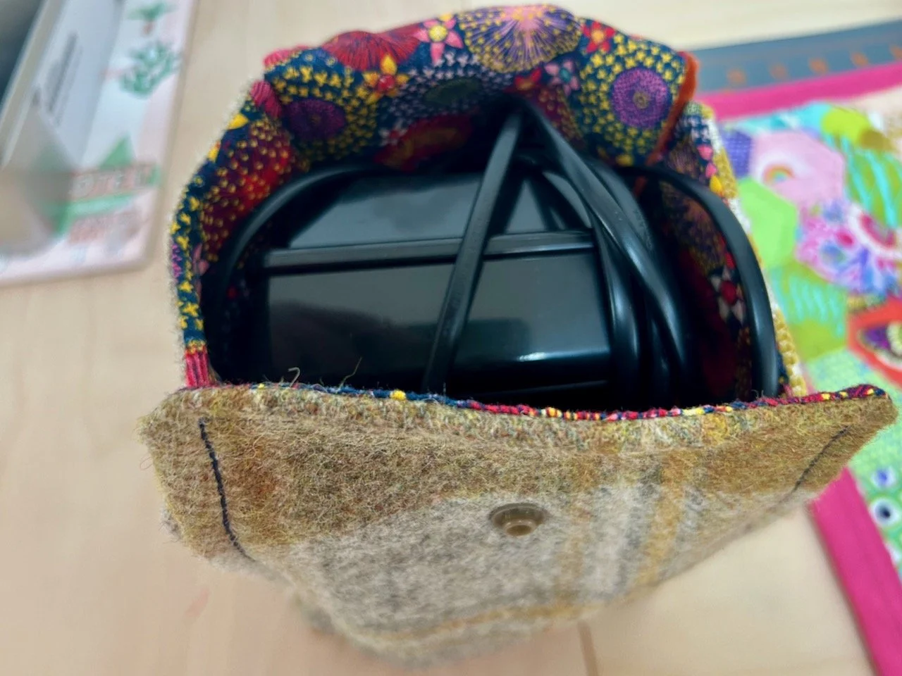 The completed pouch, complete with sewing machine foot pedal inside