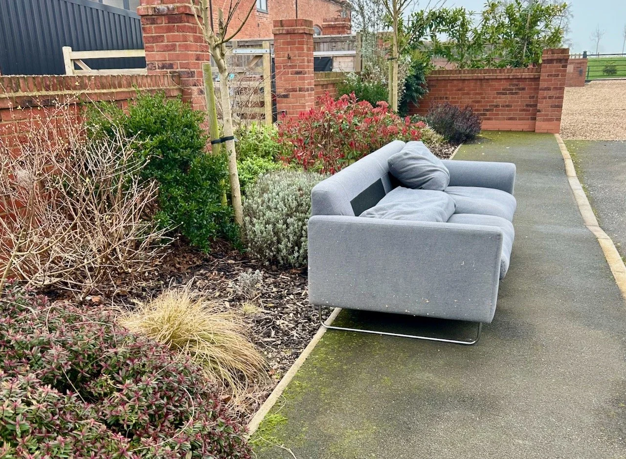 Our old three seater sofa waiting to be collected by the council