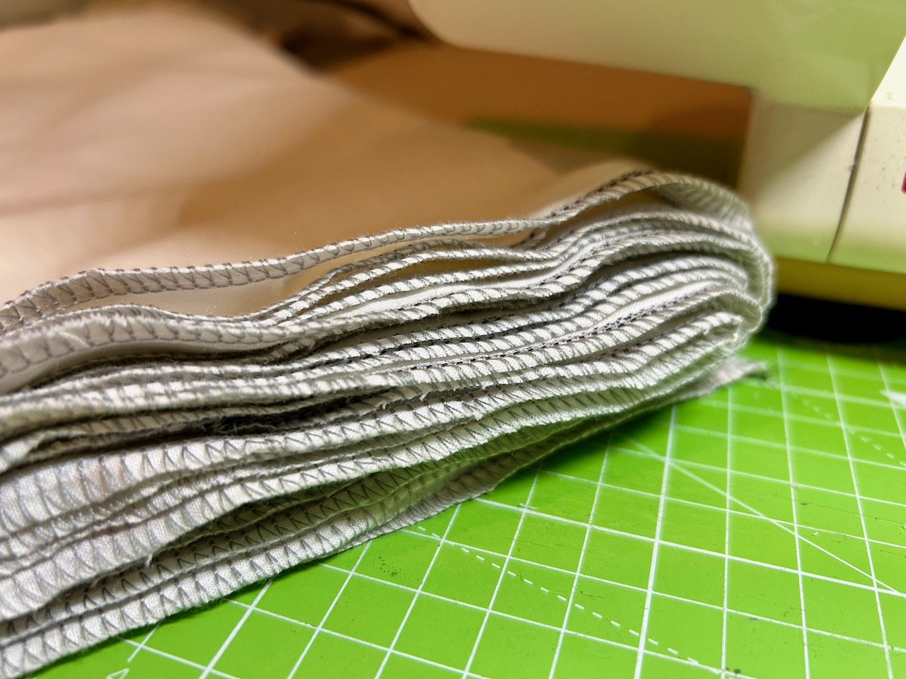 A folded overlocked length of material ready for one of my next projects