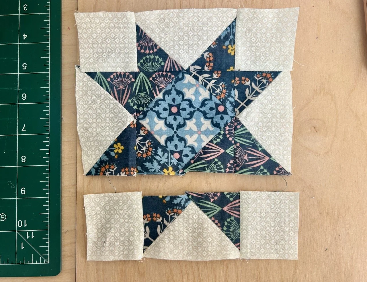 Three rows of the block sewn together with two rows attached - the final row is adrift and waiting to be attached