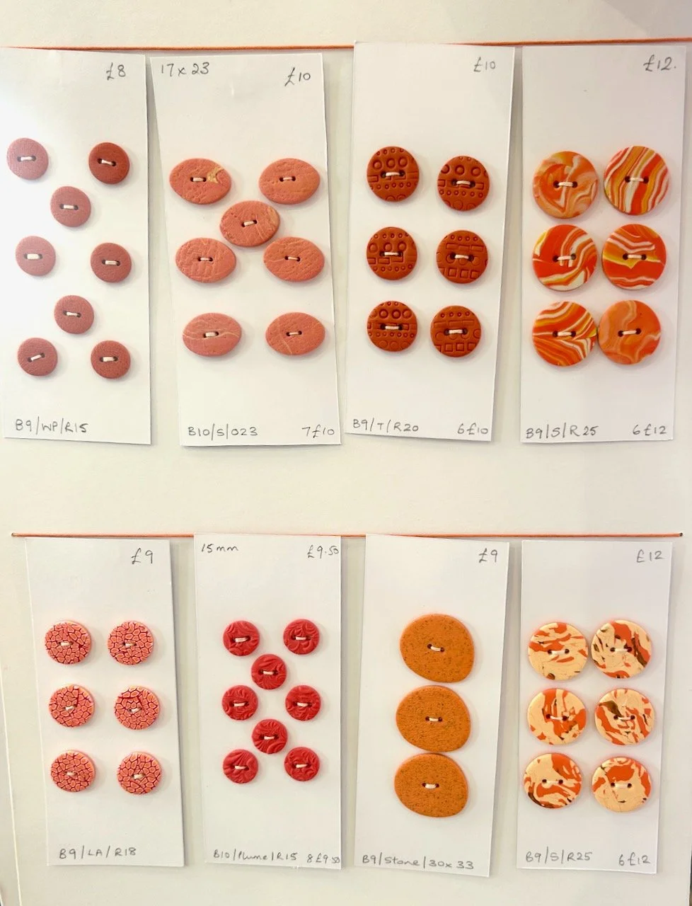 cards of orange polymer clay buttons by Jo Hunter Wearable Art