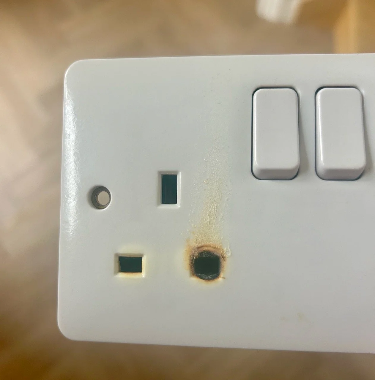 the offending socket with scorch marks