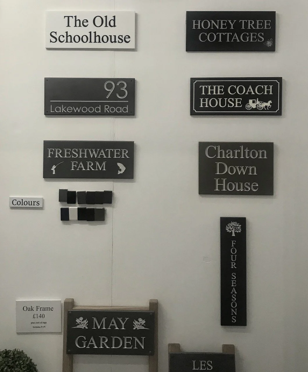 Door signs hung on the stand at Grand Designs Live