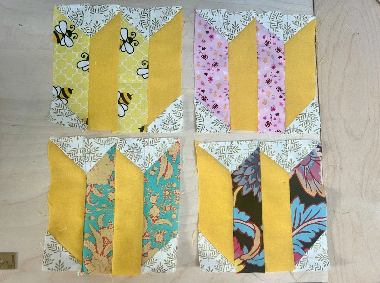 The four centre blocks sewn - and four tulips emerge
