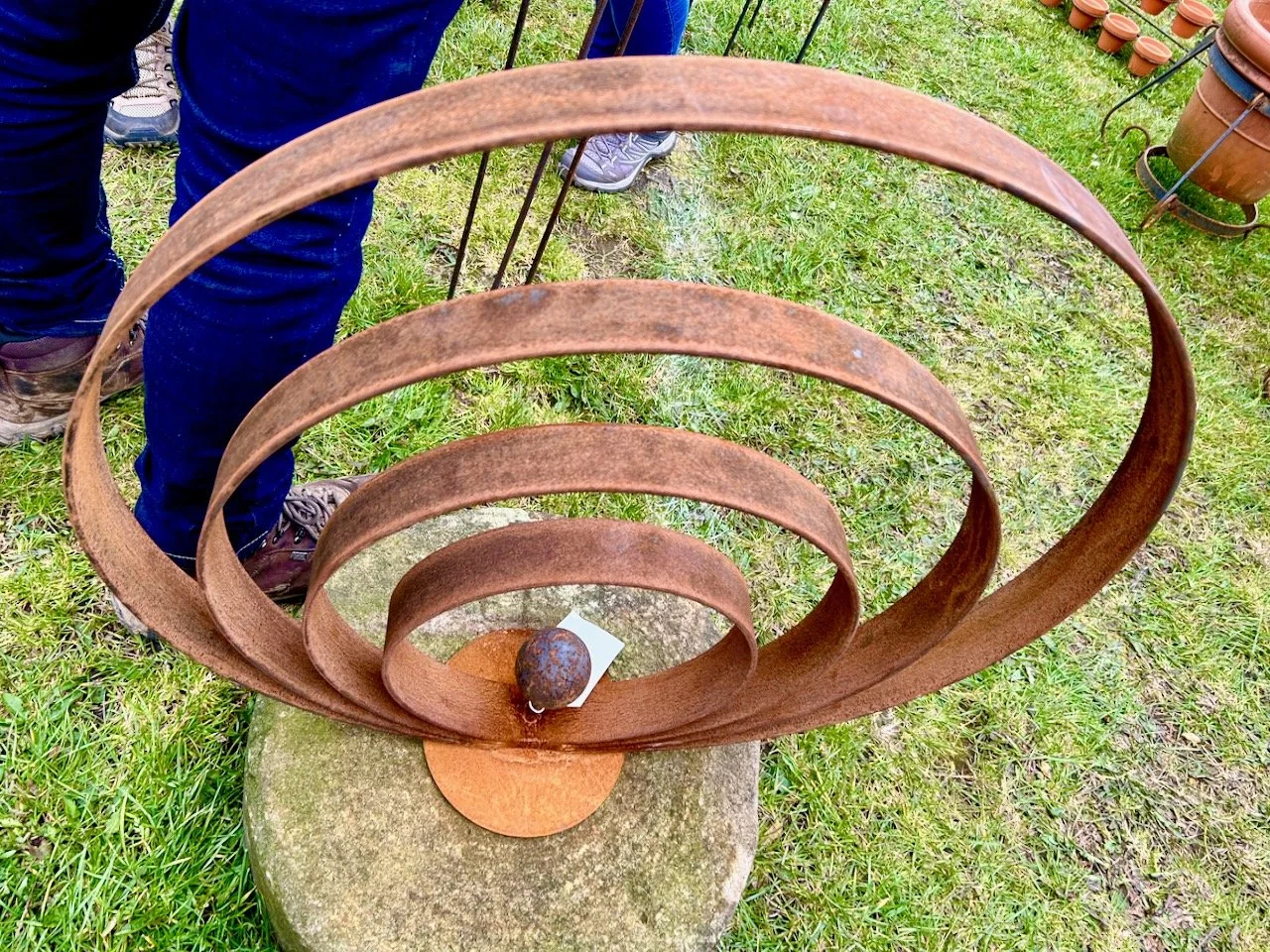 Five iron rings within each other mounted on a mill stone