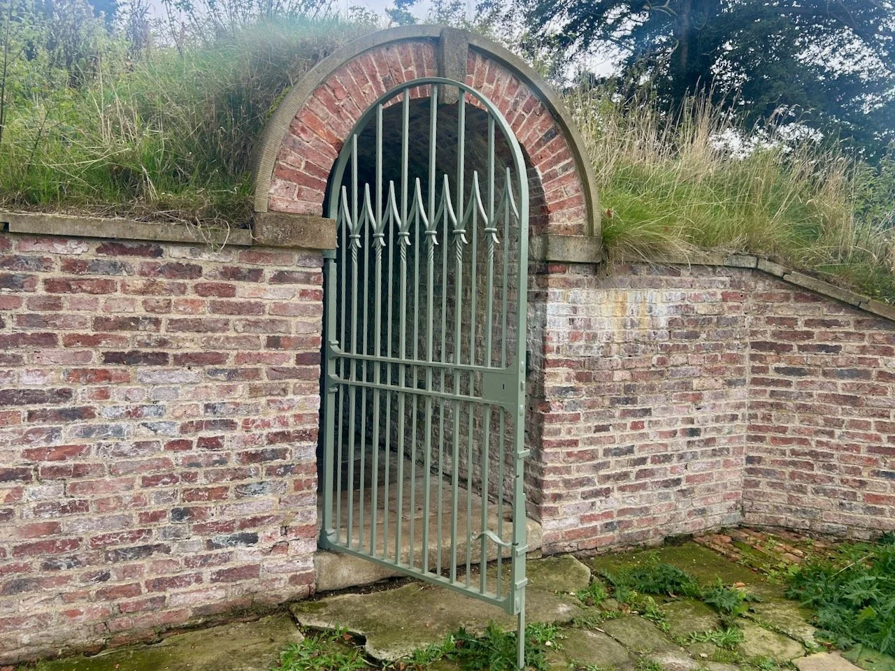 The metal gate at the entry to the Old Ice House at Scampston Hall