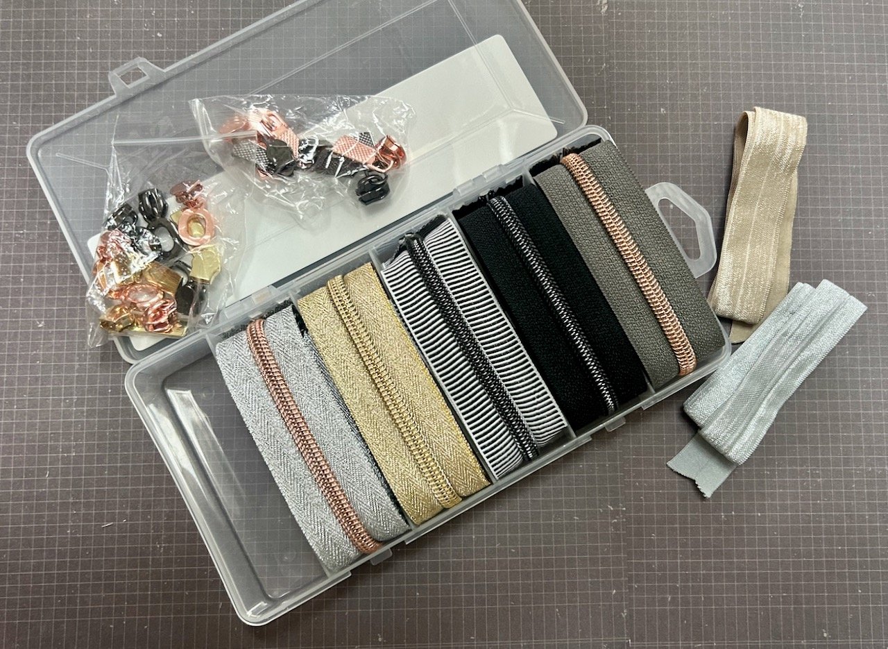 metallic zippers and accompanying attachments