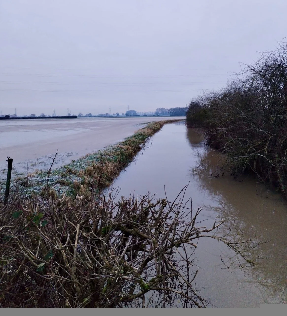The bridge at Moor Lane - with both field and stream full of water