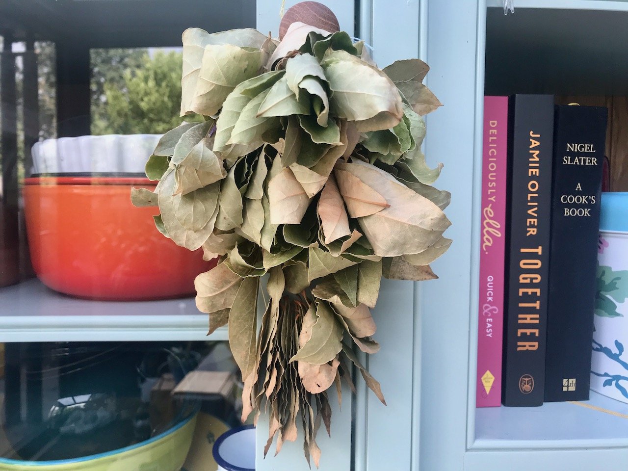 The dried bayleaves hanging on the dresser handle