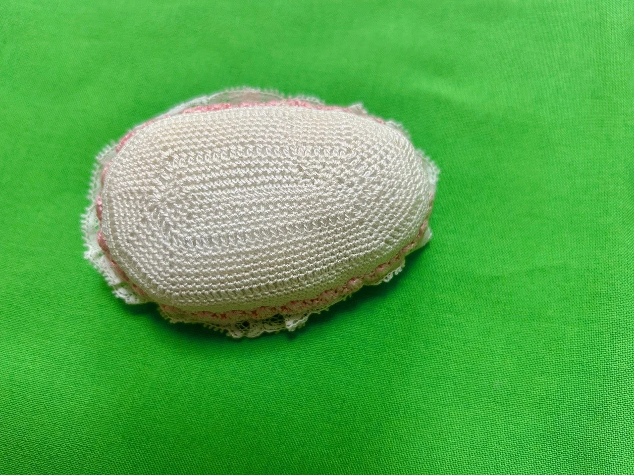 the underside of the delicate pin cushion