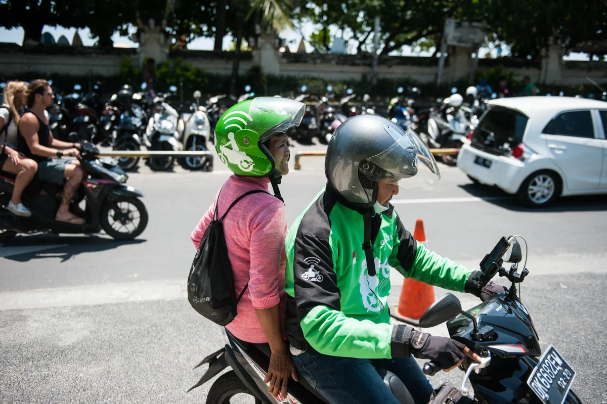 Yayuk takes motorcycle taxis and public transportation to get around.