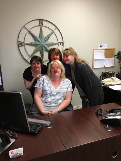 Our staff having fun with their red noses!