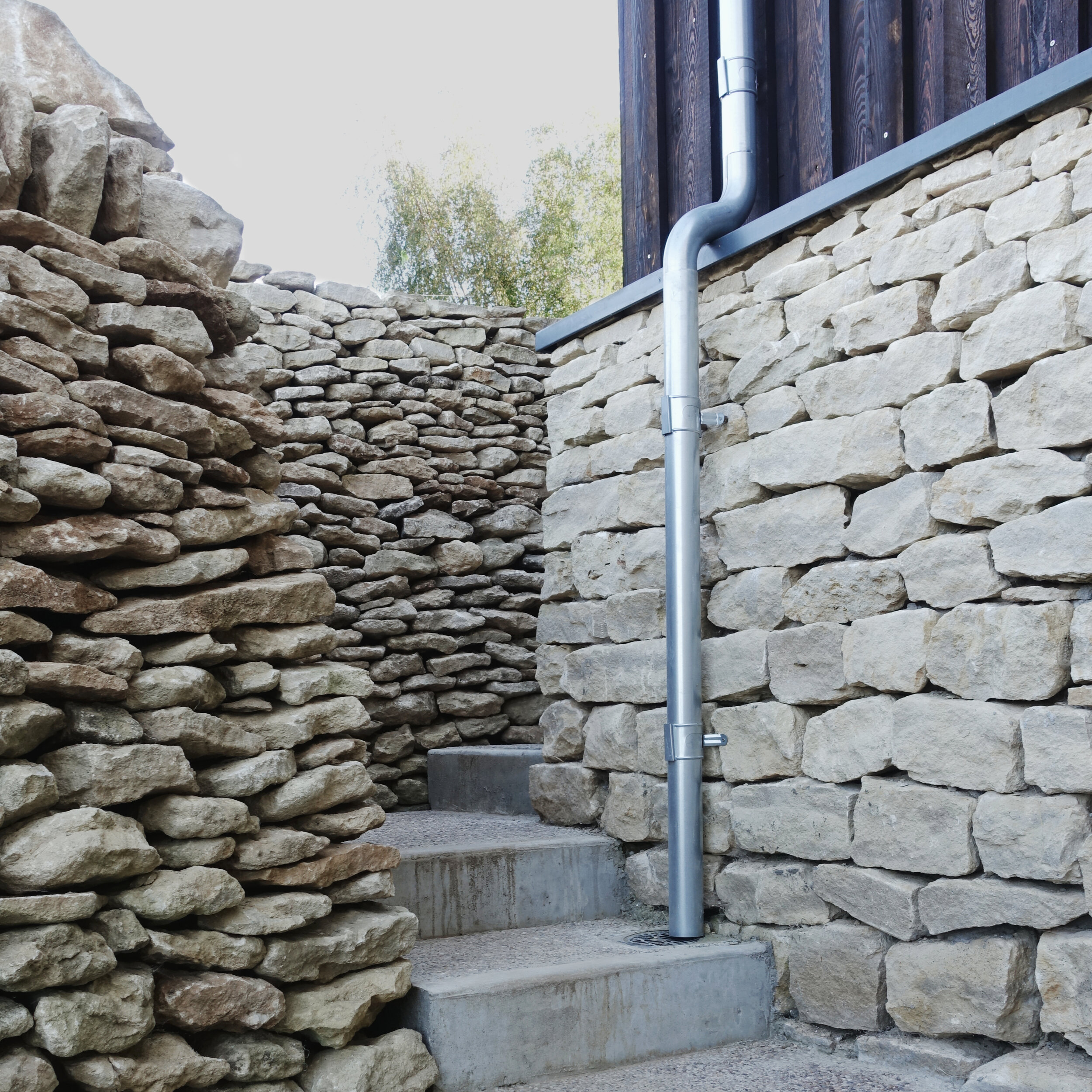    The dry-stone walling is particularly impressive when you realise that all the stone used has come from excavation on site and has been dressed and assembled by the client. We are really pleased that the materials and details have worked so well o