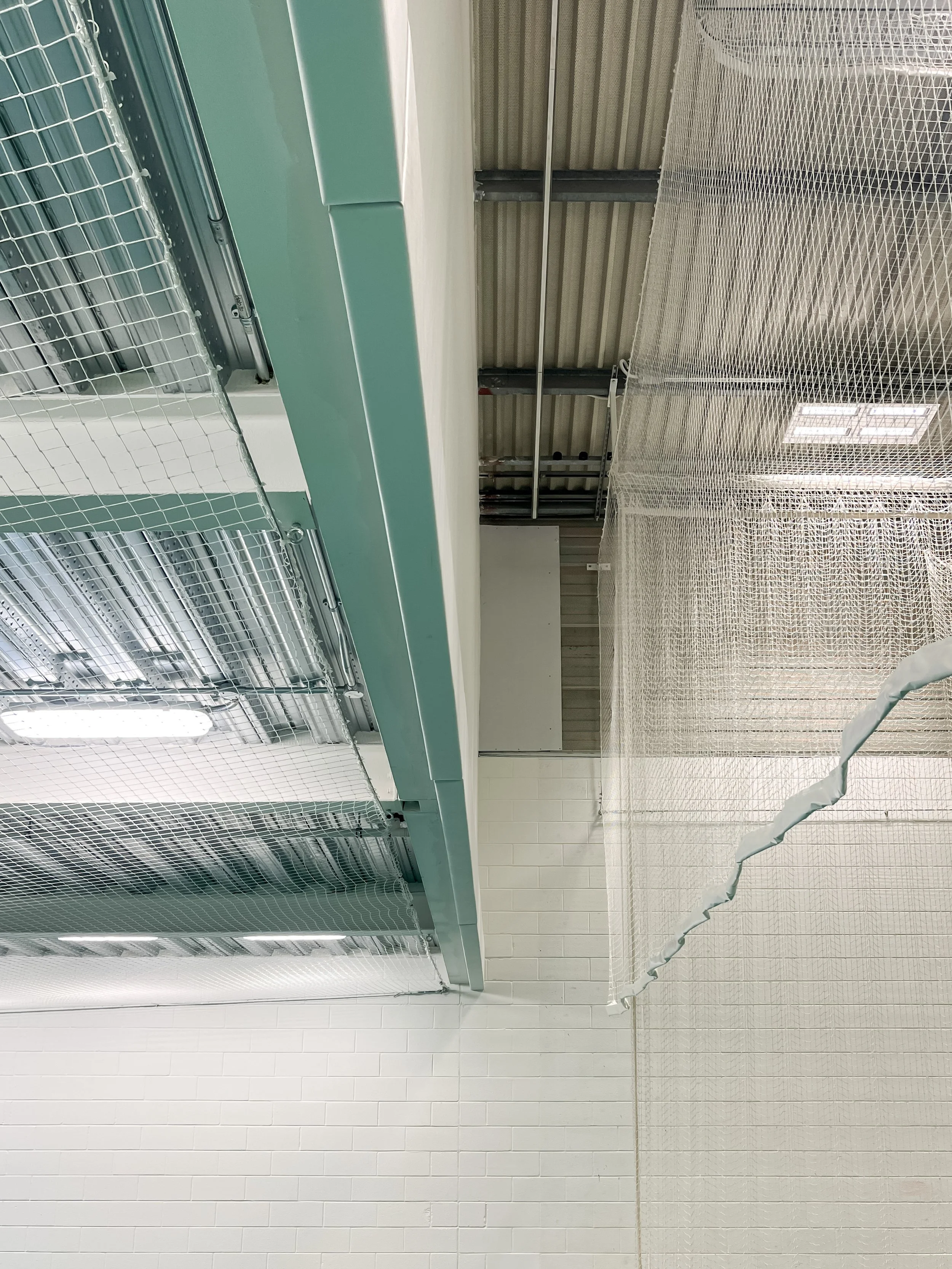 Bespoke netting design protects the mezzanine